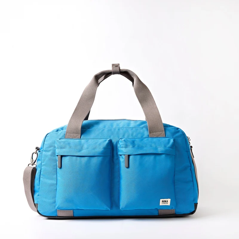 ROKA Gatwick Medium Tasche aus recyceltem Canvas | Malibu Blau