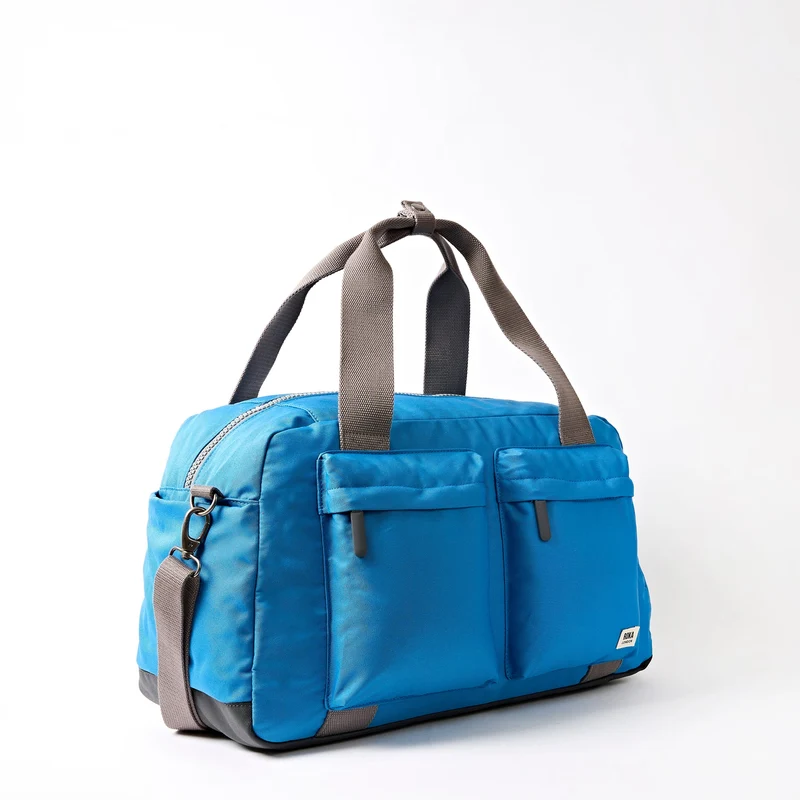 ROKA Gatwick Medium Tasche aus recyceltem Canvas | Malibu Blau