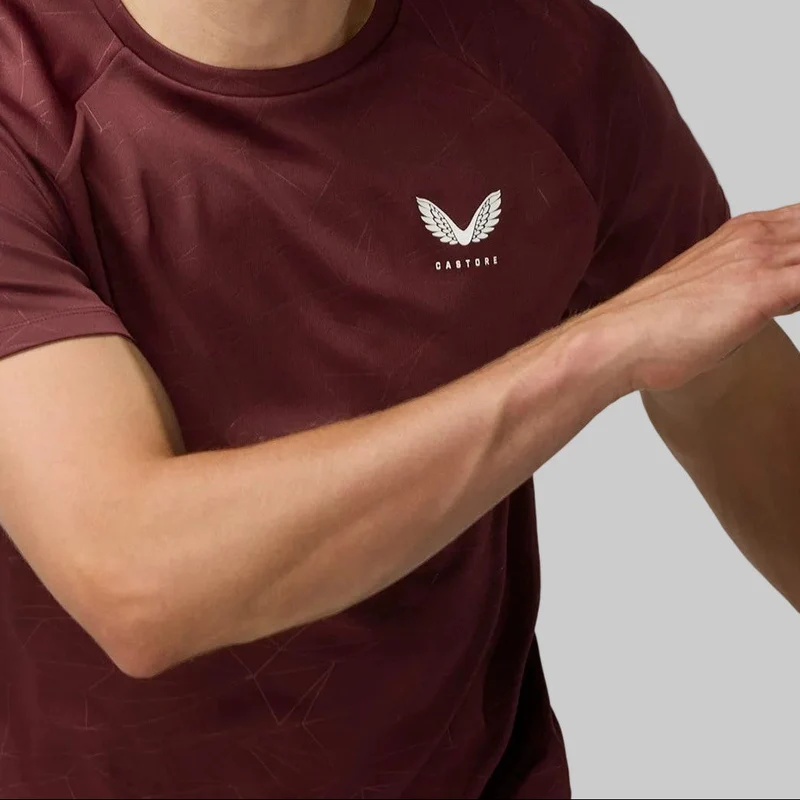 Castore Adapt Trainings-T-Shirt für Herren | Pflaumenminz