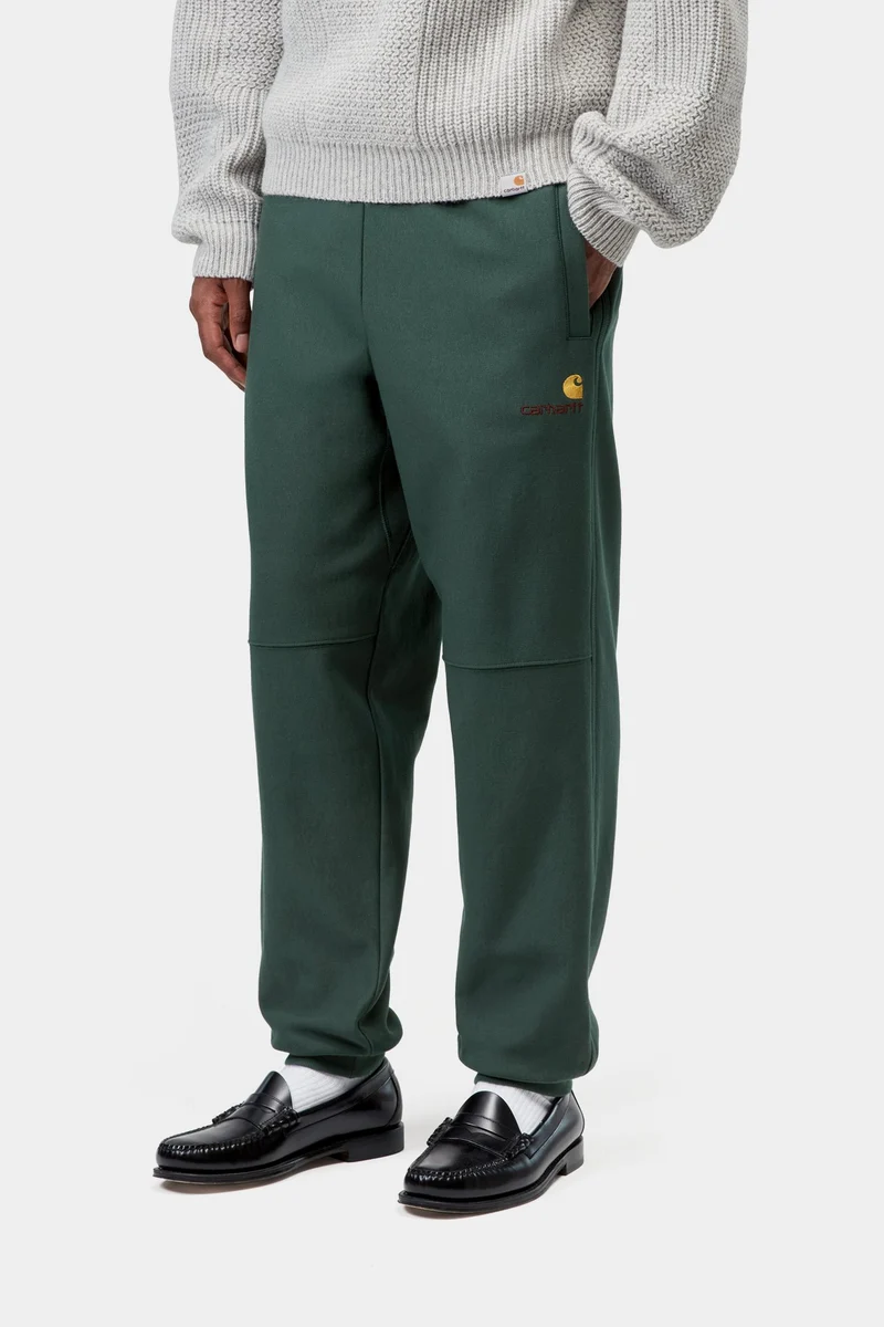 Carhartt WIP Herren American Script Jogginghose | Grün