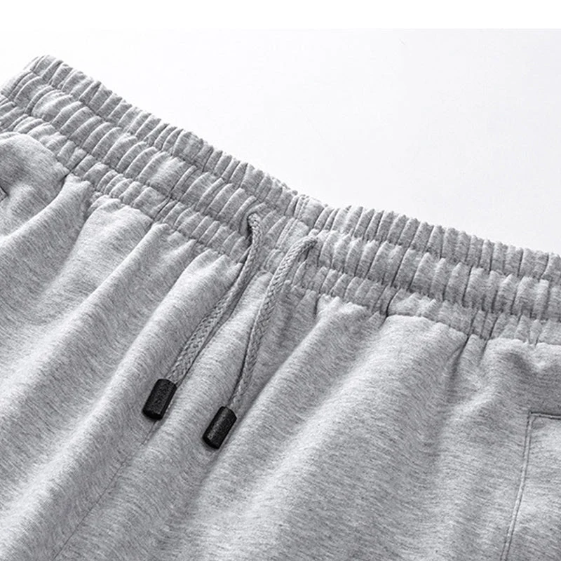 Rhodieve | Elastische Sportshorts mit Reißverschlusstaschen