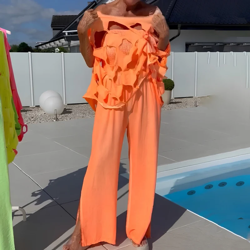Jeshaly | Schulterfreies Jumpsuit-Set mit dekorativem Übertop