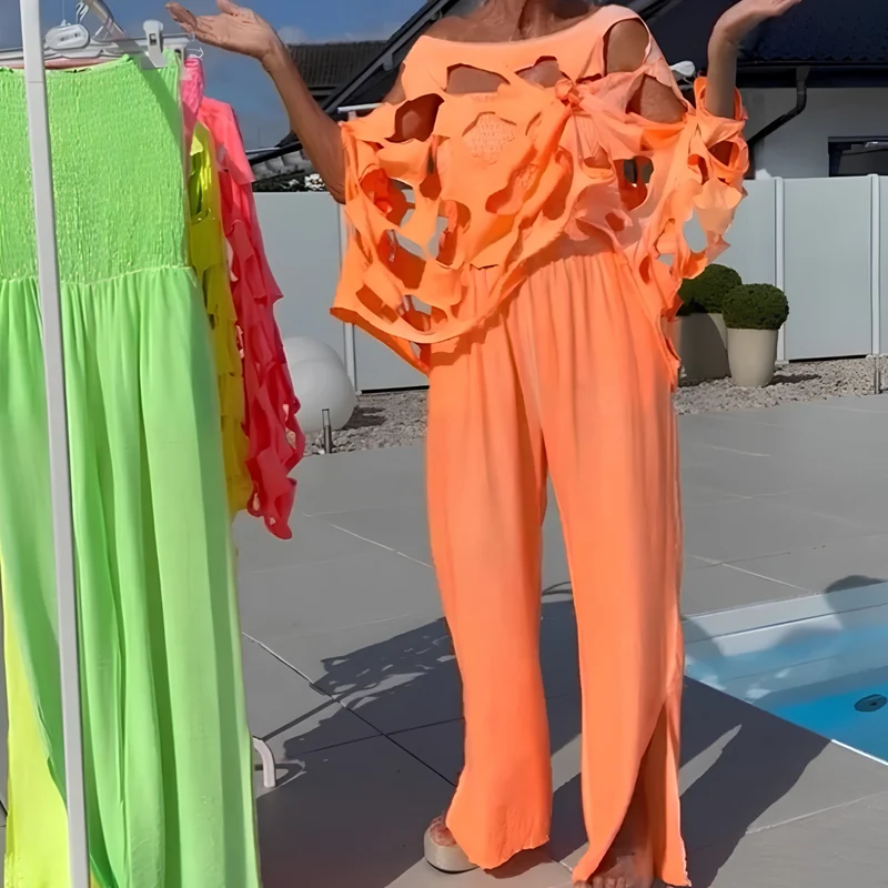 Jeshaly | Schulterfreies Jumpsuit-Set mit dekorativem Übertop