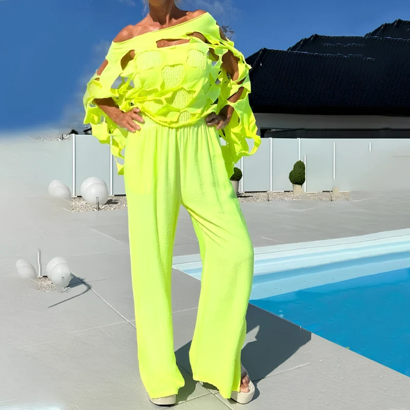 Jeshaly | Schulterfreies Jumpsuit-Set mit dekorativem Übertop