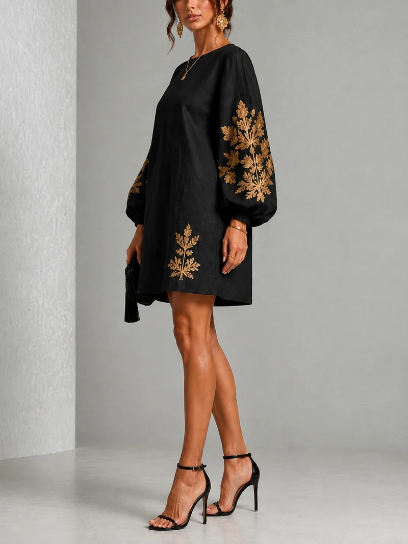 Eisele | Lockeres schwarzes Minikleid mit goldenen Blumendetails