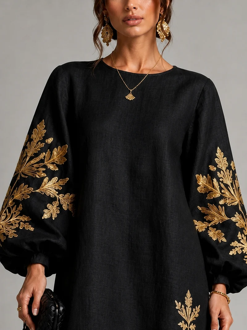 Eisele | Lockeres schwarzes Minikleid mit goldenen Blumendetails