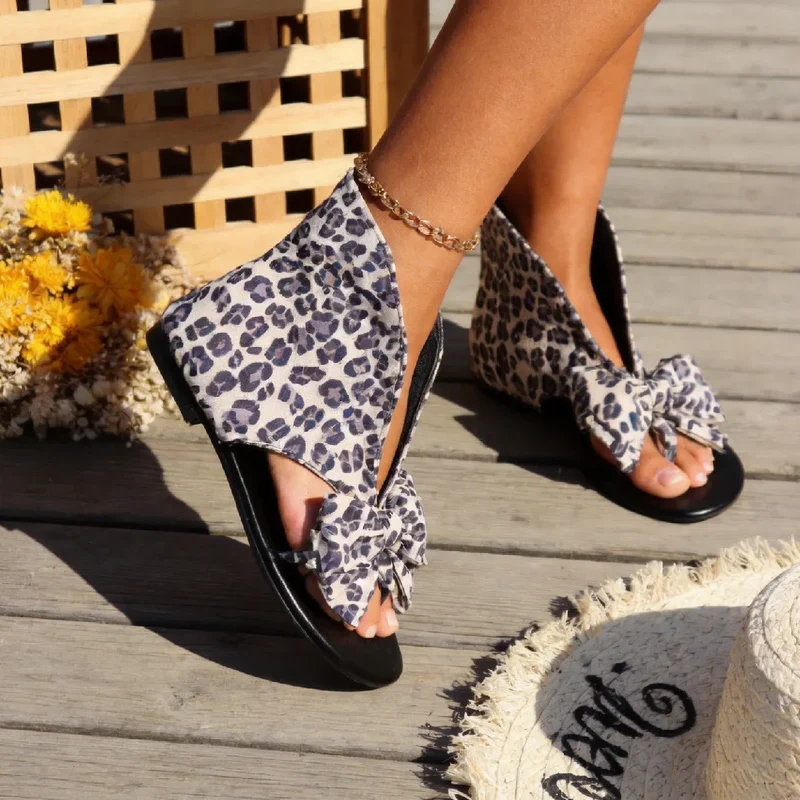 Carylle | Flache Sandalen mit großer Schleife