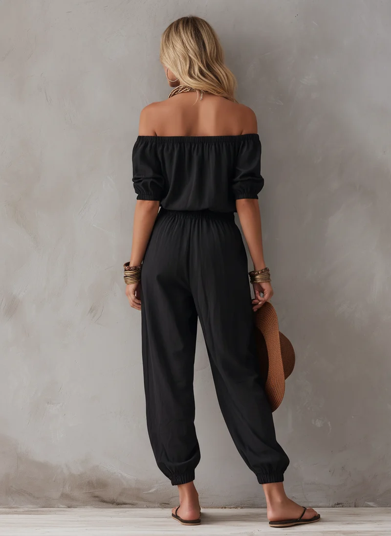 Joesy | Lässiger schwarzer Off-Shoulder-Jumpsuit