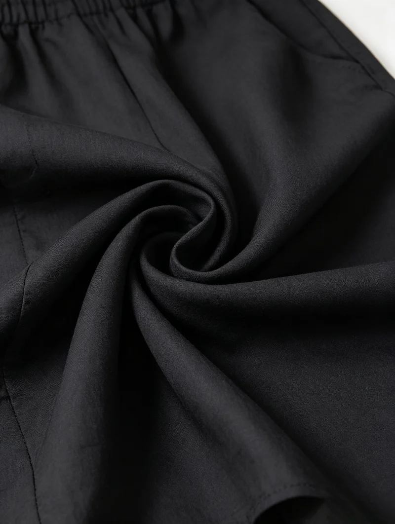 Joesy | Lässiger schwarzer Off-Shoulder-Jumpsuit