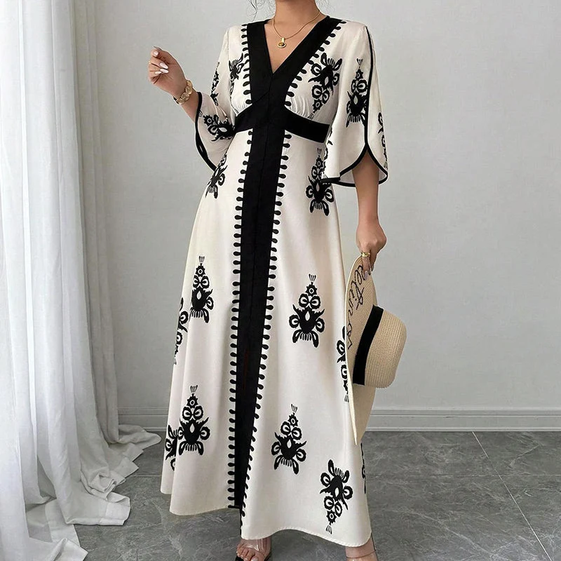Qoucie | V-Ausschnitt-Maxikleid mit eleganter Sommernote