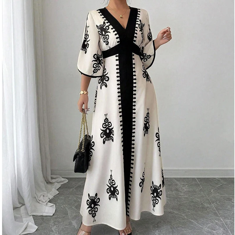 Qoucie | V-Ausschnitt-Maxikleid mit eleganter Sommernote