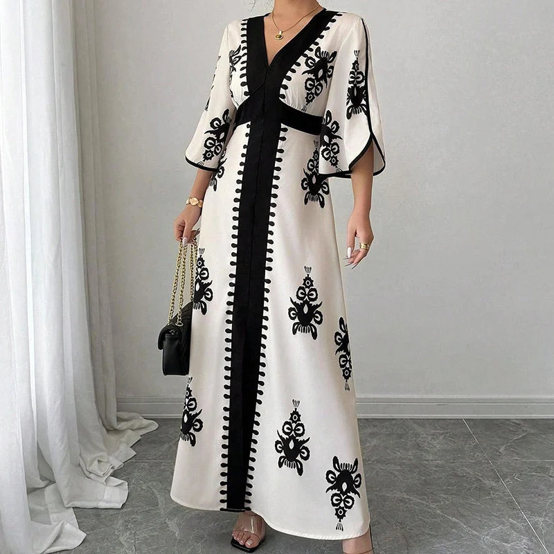 Qoucie | V-Ausschnitt-Maxikleid mit eleganter Sommernote