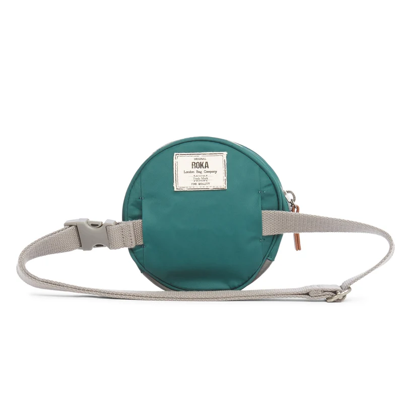 ROKA Paddington D Türkisfarbene, extra kleine Tasche aus recyceltem Nylon