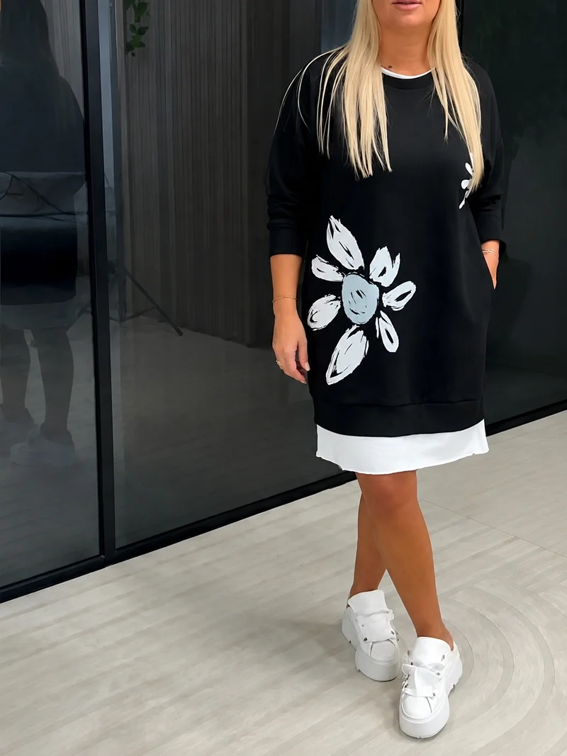 Lercka | Stilvolles Langarmkleid mit floralem Akzent