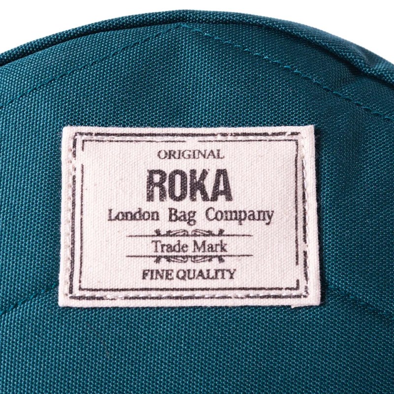 ROKA Paddington Kleine Tasche aus recyceltem Canvas, türkisfarben