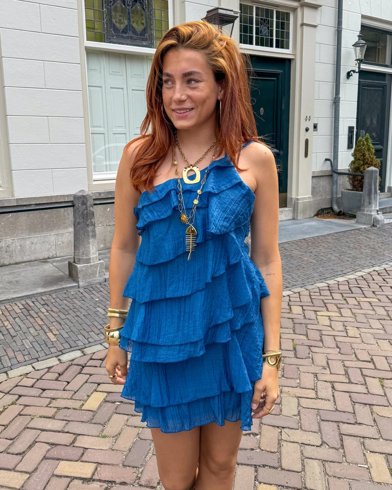 Miniabito estivo da donna asimmetrico con volant