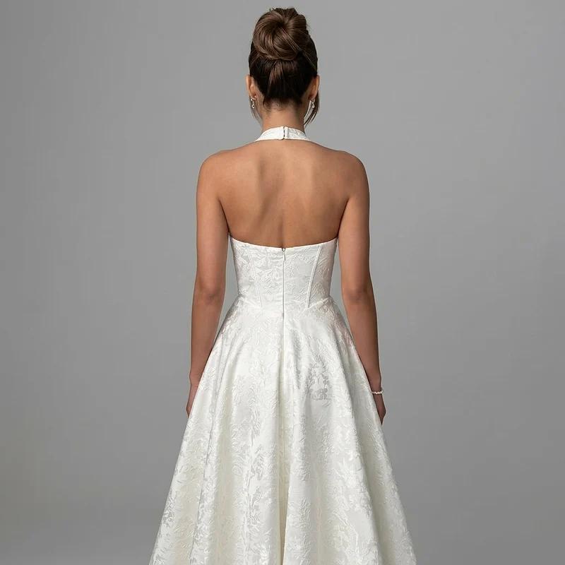 Damen Neckholderkleid mit Korsett Oberteil und Strukturmuster und Schleife am Nacken