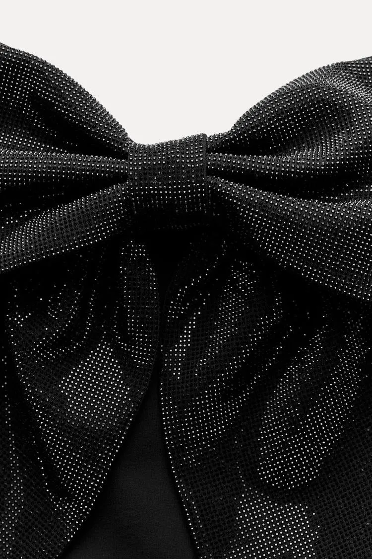 Damen-Top mit Schleifendetail und Glitzer-Struktur