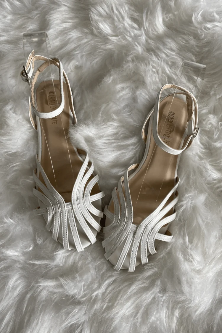 FLACHE GEFLOCHTENE SANDALEN